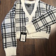 Girls Black And White Plaid Cardigan. Never Worn Tags Attached White Winter Sweater For School, Winter School Black Sweater, Black Winter Sweater For School, White Long Sleeve Sweater For School, Cute Black Cardigan For Fall, Black Fall Sweater For School, White Winter Cardigan For School, Trendy Winter Tops For School, Class Shirts