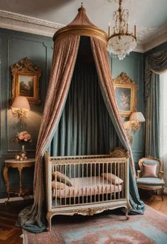 a baby's room with a canopy bed, chandelier and paintings on the walls