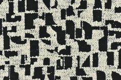 an abstract black and white pattern on fabric