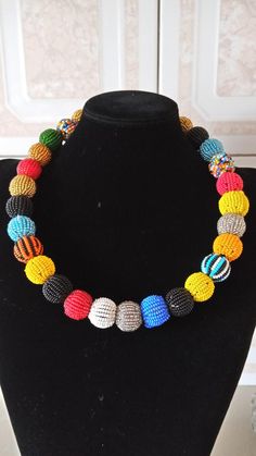 Colorful Beaded Necklace, African Beaded Jewelry, African Necklace, Handmade Necklace, Multi color Necklace, Gift For Her, NecklaceThis colorful beaded necklace is superbly crafted which can be worn with any outfit at different occasions and it will absolutely makes you stand out.Main color -multi color.The necklace can be available in plain colors.Wholesale available at a fair price,please contact me.For any clarification,please send me a convo or an e-mail.Thank you for visiting and happy shop Multicolor Beaded Round Beads Jewelry, Unique Multicolor Faceted Beads, Adjustable Multicolor Beaded Necklaces With Large Beads, Adjustable Multicolor Beaded Necklace With Large Beads, Multicolor Polished Beads Bracelet, Multicolor Polished Round Beads Bracelet, Multicolor Round Spacer Beads Jewelry, Unique Multicolor Necklaces With Faceted Beads, Unique Multicolor Necklace With Faceted Beads