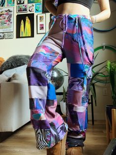 Made to Order/Pre-Order Item! Please allow up to 3 months for shipment. Handmade cotton spandex jersey and bamboo fleece mixed patchwork joggers. These are a mix of large and small patchwork pieces for a super trippy/psychedelic unique pair of sweats! Choose 2-3 patterns and 3 bamboo fleece colors to create your own custom pair. Original patterns designed by me. Printed on cotton spandex jersey (93% cotton, 7% spandex)  Bamboo fleece: 66% Bamboo Viscose, 28% Organic Cotton, 6% Spandex SIZING: sh Pink Cotton Patchwork Bottoms, Pink Cotton Patchwork Pants, Multicolor Patchwork Pants For Loungewear, Multicolor Cotton Sweatpants With Pockets, Multicolor Patchwork Bottoms For Loungewear, Patchwork Long Pants For Loungewear, Multicolor Cotton Sweatpants For Spring, Spring Multicolor Cotton Sweatpants, Cotton Patchwork Bottoms For Loungewear