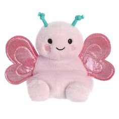 a pink stuffed animal with green wings