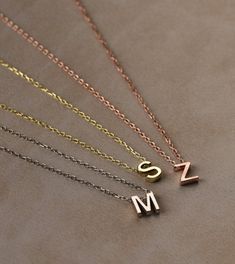 You can customize this necklace with a letter of your choice. All our necklaces are suitable for all kinds of clothing and add a great sparkle to your wardrobe.  #charmnecklace #choker #personalizednecklace #customnecklace #necklace #personalizedjewelry #customjewelry #pendant #birthdaygift #valentinedaygift #giftforher #namenecklace #initialnecklace #letternecklace #danglenecklace Necklace With A Letter, Letter Necklace Silver, Floating Diamond Necklace, Fashion Accessories Trends, Tiny Necklace, Dainty Initial Necklace, Diamond Bar Necklace, Custom Initial Necklace, Baby Mom