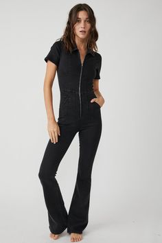 Style No. 79111068; Color Code: 001 Our top-rated Jayde Flares — now in a stunning jumpsuit! The timeless flare silhouette you know & love in a curve-hugging instant outfit. Fit: Slim through the bodice and thigh with flared leg designFeatures: Exaggerated yoking and darting throughout, zip-up closure, collared neckline, vintage-inspired denim wash, stretch denimWhy We <3 It: So flattering with sultry edge, you’ll be reaching for this jumpsuit from season to season. We The Free Heritage inspired and lived-in staples. We The Free is an in-house label. Care/Import Machine Wash Cold Import Measurements for size small Bust: 33 in Waist: 27 in Hips: 33 in Rise: 12 in Inseam: 33 in Sleeve length: 7.5 in Inseam (Short): 31 in Chic Fitted Flare Jumpsuits And Rompers, Spring Flare Fitted Jumpsuits And Rompers, Fitted Full-length Denim Jumpsuit, Fitted Short Sleeve Jumpsuits For Fall, Chic Fitted Denim Jumpsuit With Short Sleeves, Denim Jumpsuit Short, Free People Jumpsuit, Denim Short Jumpsuit, Cropped Graphic Tees