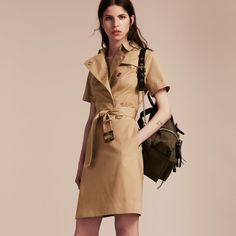 A slim and tailored trench dress cut from our English-woven cotton gabardine. The elegant short-sleeved design references signature trench coat details, from epaulettes to a belted waist. Wear for an elegant look during the day, right through to evening. Designer Fall Workwear Dresses, Designer Workwear Dresses For Fall, Burberry Dress Women, Short Bride, Burberry Dress, Trench Dress, Short Dresses Casual, Luxury Dress, Dress Cuts