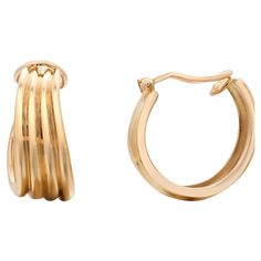 Elevate your jewelry collection with these exquisite Vintage Tiffany & Co. Ribbed Hoop Earrings. Meticulously crafted from 18 karat yellow gold, these earrings are a testament to timeless elegance and superior craftsmanship. Key Features: Material: Made from luxurious 18 karat yellow gold, ensuring a rich, warm hue that complements any skin tone. Design: The earrings feature a sophisticated ribbed design that adds texture and depth, making them a standout piece for any occasion. Brand Marking: E Luxury Trendy Yellow Gold Hoop Earrings, Luxury Designer Yellow Gold Hoop Earrings, Tiffany Hoop Earrings, Tiffany And Co Gold, Triple Hoop Earrings, Vintage Gold Earrings, Tiffany Diamond, Tiffany Earrings, Contemporary Earrings