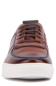 A faux-leather upper elevates a casual sneaker with a low profile that's perfect for everyday wear. Synthetic upper, lining and sole Imported Brown Leather Sneakers With Removable Insole, Low-top Faux Leather Sneakers With Rubber Sole, Casual Faux Leather Sneakers With Round Toe, Brown High-top Sneakers With Perforations, Brown Leather Cushioned Sneakers, Leather Slip-on Sneakers For Fall, Brown Sneakers With Contrast Sole For Fall, Modern Leather Sneakers For Fall, Fall Brown Sneakers With Contrast Sole