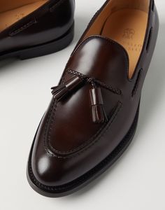 Aged calfskin loafers with tassels The timeless elegance of the loafer is enriched with the excellence of Brunello Cucinelli materials. Careful craftsmanship provides the antiqued calfskin with special shading that defines the footwear’s vintage feel, completed by the distinct tassels detail. A leather and rubber outsole ensures comfort. Luxury Wingtip Tassel Loafers For Business, Luxury Goodyear Welted Tassel Loafers For Business, Luxury Leather Sole Tassel Loafers For Semi-formal Occasions, Luxury Semi-formal Tassel Loafers With Leather Sole, Luxury Wingtip Tassel Loafers For Semi-formal Occasions, Luxury Goodyear Welted Loafers For Galas, Luxury Brown Tassel Loafers For Semi-formal, Luxury Brown Tassel Loafers For Semi-formal Occasions, Luxury Semi-formal Tassel Loafers