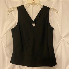 Loft Size Petite 2 Black Sleeveless Tank Top Blouse. V-Cut Neckline With Ribbed Detailing. Lined Blouse. Zipper On Side. Doesn't Stretch. New With Tags Never Worn. Chic V-neck Evening Vest, Elegant Sleeveless V-neck Top For Work, Elegant V-neck Vest Top, Black V-neck Vest For Night Out, Elegant Sleeveless V-neck Top For Spring, Elegant Stretch V-neck Vest, Formal V-neck Camisole, Elegant Black V-neck Tank Top, Black Summer Formal Vest