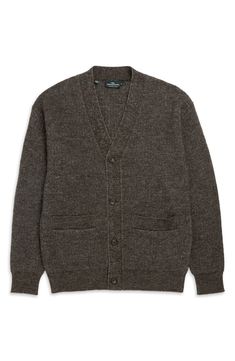 Layer up in the polished good looks of this cardigan knit from fine merino wool enhanced with the luxurious soft touch of alpaca for a timeless addition to your outfit. Front button closure V-neck Long sleeves 70% merino wool, 30 % alpaca Dry clean Imported Formal Wool V-neck Cardigan, Luxury V-neck Fall Outerwear, Classic Brown Knitted Outerwear, Classic Knitted Brown Outerwear, Classic Alpaca Sweater For Winter, Elegant Wool Cardigan With Shawl Collar, Formal Fall Cardigan With Shawl Collar, Elegant Long-sleeved Merino Wool Sweater Coat, Elegant Long Sleeve Merino Wool Sweater Coat