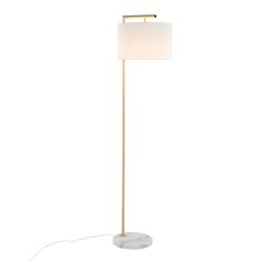 a floor lamp with a marble base and a white shade on the top of it