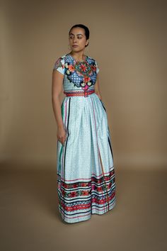 Based in: México The Talavera Capsule Collection, first introduced in 2019, returns with a limited selection available to order through our collaboration with Nayibi. This collection draws inspiration from the traditional art of Talavera, a centuries-old technique for crafting earthenware and enameled tiles renowned for its intricate, hand-painted patterns and rich colors. Characterized by vibrant blues and greens, each piece is carefully crafted by hand using locally sourced clay, reflecting th South American Fashion, Square Skirt, Mexican Folklore, Mexico Fashion, Painted Patterns, Graceful Movement, Talavera Pottery, Mexican Dresses, Mexican Culture