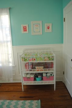 a baby crib in the corner of a room