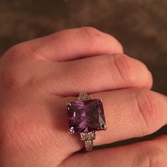 Beautiful Purple Square Cubic Zirconia Ring. Available In Size : 7, 8, 9. Elegant Purple Rings Stamped 925, Elegant Crystal Ring With Cubic Zirconia 925 Stamped, Elegant Crystal Ring With Cubic Zirconia Stamped 925, Elegant Stamped 925 Crystal Ring, Elegant Formal Amethyst Ring Stamped 925, Silver Princess Cut Hallmarked Jewelry, Princess Cut Hallmarked Silver Jewelry, Elegant Crystal Ring For Formal Occasions, Formal Princess Cut Crystal Ring