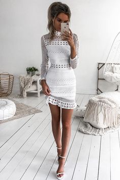 The Riverdale Dress in white features a gorgeous custom made lace with beautiful detail at the neckline, waist and hem. It has full lining with no lining at the White Lace Crochet Dress For Party, Fitted Lace Mini Dress With Crochet Details, Fitted Mini Lace Dress With Crochet Details, Fitted Mini Dress With Crochet Lace, White Long Sleeve Lace Dress With Scalloped Lace, Fitted Mini Lace Dress With Crochet Lace, Fitted Mini Length Crochet Lace Dress, White Crochet Dress With Scalloped Lace For Parties, White Fitted Crochet Dress With Lace Sleeves