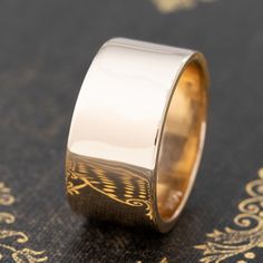 Chic and timeless cigar band from Tiffany & Co! She is the perfect index finger or middle finger ring and better yet, an engagement band or wedding band. Unique and one of a kind - she slips on like buttah on the finger! 14kt yellow gold Size 7.5 & resizable with limitations 10.4mm in width & 1.33mm thick 12.1 grams Please see qualitative report for more information. 14k Rose Gold Wide Band Wedding Ring, Timeless Thick Band Ring For Anniversary, Elegant Formal Wide Band Ring With Decorative Band, Classic Formal Wide Band Ring With Open Band, 14k Gold Thick Band For Promise, Classic Wide Band Ring With Decorative Band, Classic Wide Band Anniversary Bands, Classic Wide Band For Anniversary, Yellow Gold Wide Band Fine Jewelry