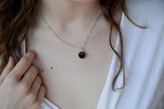 Large black onyx necklace. Elegant necklace. Please select your length. __ o n y x __ l o v e __ n e c k l a c e __ <3 ♥ This piece is handmade with 14k yellow gold filled chain and a single round 12 mm bezel pendant. ♥ You can select your size from the drop-down menu. The length includes the chain, pendant and the closure. The pictured necklace is 40 cm (16 inches) long. ♥ All pieces are handmade to order. I can make a piece that will satisfy your imagination, a personalized piece that will Everyday Round Onyx Jewelry, Classic Black Jewelry For Everyday, Classic Black Necklace With Round Pendant, Classic Black Necklaces With Round Pendant, Black Enamel Round Pendant Jewelry, Black Enamel 14k Gold Necklace, Elegant Everyday Jewelry With Black Enamel, Classic Black Round Pendant Necklace, Classic Black Pendant Necklace