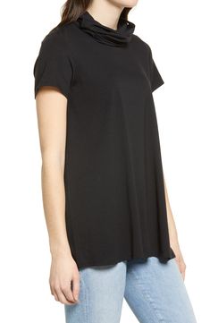 This soft, drapey T-shirt is smartly designed with a cowl neckline that's actually a gaiter mask for easy coverage when you need it. Cut from a comfortable cotton-blend jersey, the two-in-one top not only feels good against the skin but it also controls odor and is antimicrobial to keep you feeling fresh all day.This product is non-medical and intended for use with a face covering in settings when social distancing is difficult to maintain. Cowl neck with built-in gaiter mask and ear loops Short Relaxed Fit Scoop Neck T-shirt For Fall, Fall Relaxed Fit Scoop Neck T-shirt, Black Spring Cowl Neck Tops, Black Cowl Neck Top For Spring, Fall Scoop Neck T-shirt With Relaxed Fit, Trendy Cowl Neck Top For Spring, Casual Stretch Cowl Neck Tops, Casual Cowl Neck Top, Black Fitted Top For Casual Gatherings