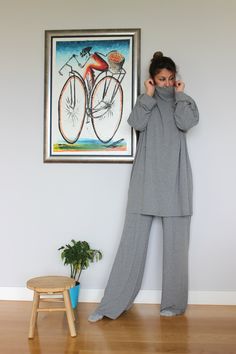 "Grey Loungewear Set of 2, Winter Loungewear, Home Outfit The super comfy set of maxi pants and maxi tunic top is the latest design for the Loungewear Collection! Super chic, super comfy this loungewear set will be your new Love for lounging at home. Made from an elastic viscose, this fabric gives you the so called \" Second Skin \" feeling ! Easy to wear , easy to care , this set is one of the \" Must have \" this season ! We have it in black and dark grey ! Soon we will have it in beige as wel Grey Loungewear, Minimalist Loungewear, Winter Lounge, Wide Leg Pants Plus Size, Winter Loungewear, Lounge Outfits, Loungewear Dress, Minimalist Clothing, Maxi Pants