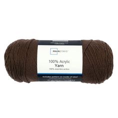 yarn ball in dark brown with white label on the front and bottom, 100 % acrylic yarn