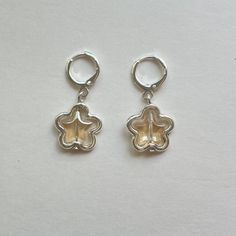 gold metal flower silver huggie earrings ☆https://www.depop.com/jencamellia/ ☆https://www.etsy.com/shop/jencamellia Aesthetic Silver Earrings, Silver Huggie Earrings, Huggie Earrings Silver, Metal Star, Dope Jewelry, Metal Stars, Metal Flower, Funky Jewelry, Huggie Earrings