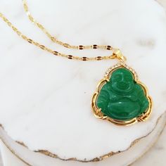 MATERIAL: 18k gold filled, genuine jade, and cubic zirconia; non-tarnish ✔ Non Tarnish ✔ Handmade ✔ Hypoallergenic ✔ Waterproof COLOR: green and gold CHAIN LENGTH: 18 inches unless otherwise requested Green Jade Jewelry For Meditation, Green Gemstone Necklace For Good Luck, Green Jade Spiritual Necklace, Spiritual Green Jade Necklace, Green Necklace For Meditation - May Birthstone, Gold Aventurine Necklace For Gift, Gold Aventurine Necklace As Gift, Spiritual Jade Necklace For Good Luck, Jade Necklace For May Birthstone With Spiritual Style