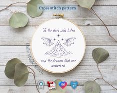 a cross stitch pattern with an image of a dragon and the words, be the hero who listen and the dreams that are answered