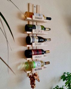 the wine rack is made out of wooden planks