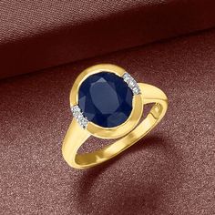 Ross-Simons - 4.50ct Sapphire Ring, Diamond Accents in 14kt Yellow Gold. Size 8. Made to be noticed, this ring is a stunner. A 4.50 carat oval sapphire is bezel-set in gleaming 14kt yellow gold and lit on either side with round brilliant-cut diamond accents. It's a must-have for any sapphire lover or September-born beauty. 1/2" wide. Sapphire ring. Sapphire birthstones are the perfect gift for September birthdays. Modern Sapphire Ring, September Born, Sapphire Dress, Yellow Gold Sapphire Ring, Sapphire Birthstone, Sapphire Necklace Pendants, Blue Topaz Bracelet, Ring Sapphire, Bezel Set Ring