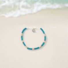 Lucky Bay Clay Bead Anklet - Teal/Orange - Mellow Monkey Colorful Oval Beads Bracelet For Beach, Beach Season Anklets With Tiny Beads, Playful Orange Bracelets For Beach, Green Bracelets With 8mm Beads For Beach, Orange Hand-strung Beaded Bracelets For Beach, Holiday Toys, Teal Orange, Sliding Knot, Beaded Anklets