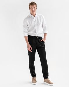 "Regular fit straight leg men's linen pants SOGLIO in Black is a summerish take on classic pants. Their design is smart and functional, making these pants a perfect fit for both casual and work outfits. Linen fabric equals comfort as it is extremely breathable. Pair these linen pants with loafers or sandals depending on the occasion, add a linen shirt and your summer outfit is complete. Details: * Regular-straight leg, mid-rise style * Flat waist band in front, elasticated waist in back * Zip fly with a coconut button closure * Two front angled pockets, two back pockets * Medium weight linen (approx. 200 gsm) * The model is wearing black pants in size M (Paired with a white shirt NEVADA in size M) and is 6'1\" (187cm) tall. Model measurements: Bust: 37\"/94cm | Waist: 30'3\"/77cm | Hips: 3 Pants With Loafers, Black Linen Pants, Mens Trousers Casual, Mens Linen Pants, Band Outfits, Trousers Casual, Classic Pants, Mens Linen, Pants For Men