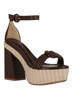 Heel height: 4.5"; Platform height: 1.6875" | Ankle buckle closure | Signature vamp strap detail | Almond toe | Ankle length, smooth finish | Specialist clean only | Upper: 50% Raffia, 50% Leather; Lower: 100% Leather | Imported Padded Heel Ankle Strap Heels For Vacation, Ankle Strap Heels With Padded Heel For Vacation, Heels With Padded Heel And Ankle Strap For Vacation, High Heel Sandals With Buckle Closure For Vacation, Chic Synthetic Wedge Sandals With Buckle Closure, Brown Strap Block Heels, High Heel Sandals With Buckle Closure In Synthetic, Strappy Round Toe Heels For Vacation, High Heel Synthetic Sandals With Buckle Closure