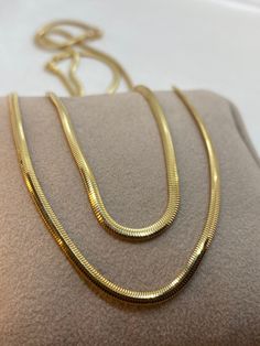 "18k Gold Herringbone Necklace,19.5\" ,2.60 mm , 7.76 gr 18k Gold Herringbone Necklace,16\" ,2.60 mm , 6.50 gr 14k Gold Herringbone Necklace,19.5\" ,2.60 mm , 5.90 gr 14k Gold Herringbone Necklace,16\" ,2.60 mm , 4.84.gr 100% Real Gold Necklace Flat Snake Necklace - Herringbone Charm - Gold Snake Charm - Traveler Herringbone Pendant ▪️ A beautiful herringbone necklace made out of 18K or 14k Solid Real Gold. Available only in yellow gold! Premium lobster Hook for added safety! Priced to sell! Com Yellow Gold Snake Chain Necklace, Yellow Gold Plated Herringbone Necklace With Box Chain, Gold Plated Yellow Gold Herringbone Necklace With Box Chain, Yellow Gold Plated Herringbone Necklace With Gold Chain, Yellow Gold Herringbone Necklace With Box Chain, Gold Plated Herringbone Necklace As Gift, Gold Plated Herringbone Necklace Gift, Gold Herringbone Necklace With Curb Chain, 14k Yellow Gold Snake Chain Necklace For Gift