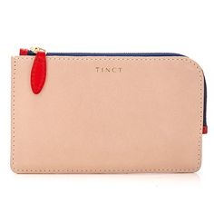 Timeless and practical the Corner Zip Wallet is the perfect everyday accessory to help keep you organised. It comes with an 8 slot contrasting removable card holder and a TINCT mini-pencil. Ideal for having a doodle. Personalise with initials or names or a heart symbol. Made in the UK. Dimensions - W:23cm x H:15cm Care of your TINCT leather products Vegetable tanned leather is a wonderful material that should be embraced in every stage of its life. Try to think of it as a living material, affected in a similar way to our own skin when exposed to the elements. In the sunshine it will darken and tan, sometimes it might get dehydrated. When it's exposed to rain it will get wet and mark, but leave it to dry naturally and it will. If you want to give your product a bit of love, use a soft brush Modern Organizer With Card Slots For Everyday Use, Modern Wallets With Pen Slots For Everyday Use, Leather Passport Wallet, Leather Travel Wallet, Leather Card Wallet, Heart Symbol, Passport Wallet, Travel Wallet, Everyday Accessories