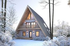 a - frame house in the woods with snow on the ground and trees around it