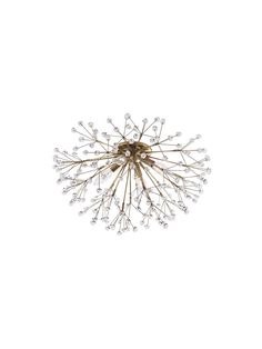 a chandelier hanging from the ceiling on a white wall with lots of beads