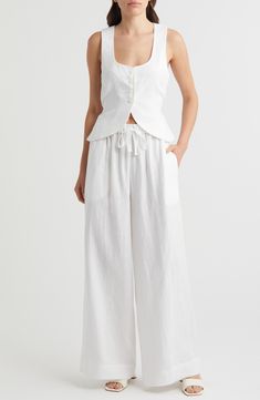 An elasticized drawstring waist comfortably tops these flowy wide-leg pants made from lightweight linen designed to get softer with each wear. Elastic/drawstring waist 100% linen Hand wash, dry flat Imported Chic Linen Wide Leg Pants With Drawstring, White Linen Wide Leg Vacation Pants, White Linen Wide Leg Pants For Vacation, Summer White Wide Leg Pants With Drawstring, White Drawstring Wide Leg Pants For Summer, Spring Linen Wide Leg Pants With Drawstring, White Linen Wide Leg Pants For Daywear, Linen Wide Leg Pants With Drawstring For Loungewear, Relaxed Fit Linen Wide Leg Pants With Tie Waist