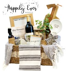 a basket filled with lots of wine and other items next to a white background that says happily ever