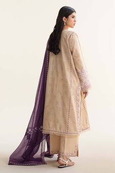 Brand: Zara ShahjahanProduct Code: D-05B DINARACollection: Coco by Zara Shahjahan Vol-02 Unstitched Lawn CollectionFabric: Lawn DESCRIPTION: Summer’s epitome of chic awaits in this stunning jacquard ensemble. Luxurious floral embroidery in vibrant beige and purple dances across the graceful shirt, perfectly paired with an embellished dupatta and cambric pants. It’s a masterpiece of timeless allure. DESIGN DETAILS: Dyed Dupatta 2.65 Yards Embroidered Organza Dupatta Border 8.6 Yards Embroidered Organza Dupatta Border 2.6 Yards Embroidered Dyed Self jacquard Front 0.7 Yards Embroidered Dyed Self jacquard Back 0.7 Yards Embroidered Dyed Self jacquard Panel 0.7 Yards Embroidered Dyed Self jacquard Sleeves 1.6 Yards Embroidered Organza Border 2.5 Yards Embroidered Organza Border 1 Yards Embroid Dupatta Border, Zara Shahjahan, Summer Basics, Embroidered Organza, Organza Dupatta, Eid Collection, Luxury Bridal, Fabric Stores Online, Jacquard Fabric