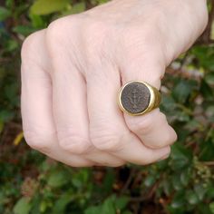 "Bring home a piece of ancient Rome  with this 18k gold pinky ring with an embedded silver coin.   The silver coin goes back to ancient Rome, feel like you are a part of history with this one of a kind pinky ring. This ring is preppy, timeless and designed for you. Feel like Roman royalty as you slip this classic ring onto your pinky. Give as a gift to the history enthusiast in your life. Handmade item Made to order DETAILS: * Ring size in stock: 4.5(47) * Ring made of 18k gold *Ancient Roman silver coin * Coin size: 0.59\"/1.5cm diameter * Ring arrives in a luxurious, high quality black leather gift box * All my jewelry is sent to you with high priority, express shipping **Custom engraving is available for most of my designs for 5$ per letter, using laser equipment for high quality result Matching Wedding Band Sets, Gold Coin Ring, Silver Pinky Ring, Wide Wedding Rings, Solid Gold Bangle, Modern Wedding Rings, Pinky Signet Ring, Contemporary Fine Jewelry, Gold Pinky Ring