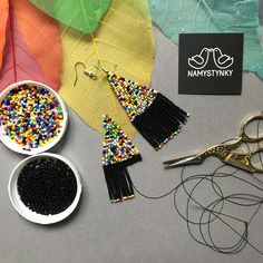 These black and colorful beaded earrings are made of high-quality Czech beads and strong synthetic thread. They are elegant, fashionable, and highly versatile, suitable for everyday wear. Features: Sterling silver components Color: black, colorful mix Length (approximate): 7.5 cm (2.95 in) This item is currently in stock. More beaded earrings http://etsy.me/2ycItdb Gerdan necklaces http://etsy.me/2mihf0J Beaded necklaces http://etsy.me/2Dkf1Fo Crochet necklaces http://etsy.me/2CAPdFc Back to sho Black Tassel Drop Earrings With Colorful Beads, Black Beaded Tassel Earrings With Round Beads, Black Tassel Earrings With Colorful Beads For Gift, Black Large Beaded Drop Earrings, Multicolor Beaded Tassel Earrings For Party, Black Beaded Drop Earrings With Large Beads, Black Bohemian Beaded Earrings With Beaded Chain, Black Earrings With Large Round Beads, Black Bohemian Beaded Chain Earrings