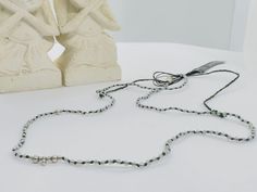 The sparkle and minimal impression of Micro cut Labradorite beads knotted on dark green rope will attract all attention.The silver beads on it are 925 raw silver. This handmade necklace is designed with artistic touches.🌬 💌D E T A İ L S All jewelry are handmade and unique  Minimal Style  Materials: Silver, Labradorite, Ropes Necklace Length:51 cm Chain Style:Knot Chain 📌S T O R A G E  A N D  C A R E   Avoid contact with moisture and perfume . When storing, avoid direct sunlight. Stones may break. Protect from impacts. Undress before bed. ✈️D E LI V E R Y Products will be ready to ship in 1-3 business days. İ can understand and accept cancellations request  before the item is shipped. Buyers are responsible for any customs and import taxes that may apply. I'm not responsible for delays d Adjustable Silver Hand Knotted Necklace, Silver Hand Knotted Necklace For Gift, Silver Hand Knotted Adjustable Necklace, Silver Hand-knotted Necklace For Gift, Adjustable Hand Knotted Beaded Necklaces For Festivals, Adjustable Hand Knotted Beaded Necklace For Festivals, Aura Necklace, Handmade Gemstone Jewelry, Labradorite Beads