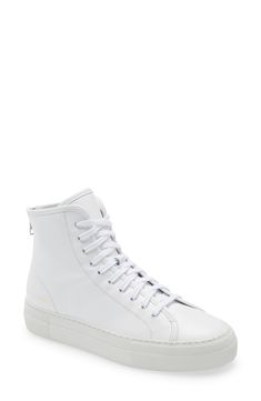 A streamlined high-top sneaker that doesn't shout, this leather kick is foil-stamped with factory ID and style codes for a look that's both sporty and smart. Style Name:Common Projects Tournament High Super Sneaker (Women). Style Number: 5636336. Classic High-top Sneakers With Perforated Toe Box, Luxury High-top Sneakers With Boost Midsole, Modern High-top Sneakers With Branded Insole, Modern High-top Sneakers With Boost Midsole, Modern High-top Sneakers With Boost Midsole And White Sole, Modern Leather High-top Sneakers With Boost Midsole, Modern Leather High-top Sneakers, Modern High-top Sneakers With Gum Sole, Modern High-top Sneakers With White Sole