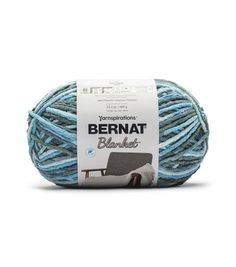 bernat blanket yarn in blue and grey colors on a white background with the label