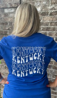 New Retro Kentucky shirt! Vintage Kentucky design with smiley face on front left chest!  Unisex Sizing!  🔹T SHIRTS🔹 Toddler 2T-5T Youth XS- Youth XL Adult S-XL Adult 2X Adult 3X 🔹LONG SLEEVE & SWEATSHIRTS🔹 Toddler 2T-5T Youth XS- Youth XL Adult S-XL Adult 2X Adult 3X If you would like to request a custom order,   please send us a message! Blue Pre-shrunk T-shirt For Everyday, Casual Everyday Pre-shrunk Tops, Casual Pre-shrunk Shirt For Everyday, Fun Graphic Print T-shirt For College, Casual T-shirt For Fan Merchandise With Relaxed Fit, Casual T-shirt With Relaxed Fit For Fan Merchandise, Casual Relaxed Fit T-shirt For Fans, Relaxed Fit Screen Print Fan Apparel Tops, Casual Fan Merchandise Top With Text Print