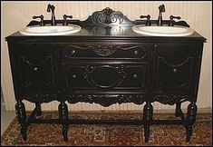 an antique double sink vanity with two white sinks