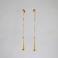 Teardrop Dangle Chain Earrings Luxury Dangle Linear Earrings With Gemstone, Modern Gold Teardrop Pendant, Modern Gold Long Drop Earrings, Gold Plated Teardrop Dangle Earrings, Tarnish Resistant Metal Teardrop Dangle Earrings, Gold Long Drop Teardrop Earrings For Pierced Ears, Gold Long Drop Teardrop Earrings, Formal Teardrop Linear Earrings Gold Plated, Tarnish-resistant Metal Teardrop Dangle Earrings