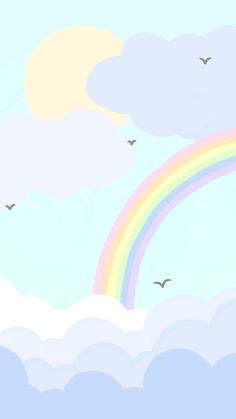 a rainbow and some birds flying in the sky