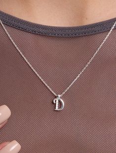 Introducing our Sterling Silver Letter Necklace, a delicate expression of personal style. This Tiny Initial Necklace features the letter "D," elegantly crafted to adorn your neckline with subtle charm. Plated in lustrous gold, this Dainty Initial Necklace adds a touch of sophistication to any outfit. Embrace individuality with this Small Monogram Necklace, a timeless accessory that speaks volumes in its simplicity. 🌸  Each piece is meticulously crafted, offering a unique and intimate touch. Ide D Necklace Initial, Letter D Necklace, Silver Letter Necklace, D Necklace, Bracelet Stands, Letter Necklace Silver, Initial Necklace Silver, Dainty Initial Necklace, Initial Necklace Gold