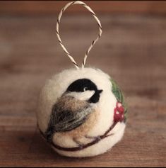 a small ornament with a bird on it